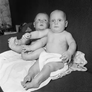 Twins Ian and Robert Kearns who both weighed eight pounds two ounces when they were born Twins Ian and Robert Kearns who both weighed eight pounds two ounces when they were born