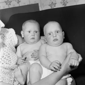 Twins Ian and Robert Kearns who both weighed eight pounds two ounces when they were born Twins Ian and Robert Kearns who both weighed eight pounds two ounces when they were born