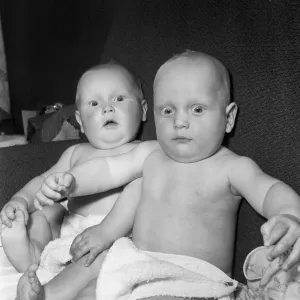 Twins Ian and Robert Kearns who both weighed eight pounds two ounces when they were born Twins Ian and Robert Kearns who both weighed eight pounds two ounces when they were born