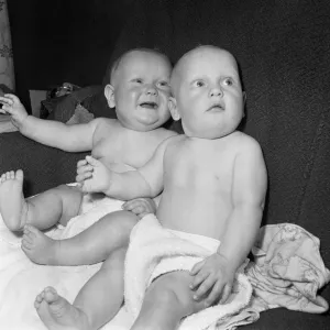 Twins Ian and Robert Kearns who both weighed eight pounds two ounces when they were born Twins Ian and Robert Kearns who both weighed eight pounds two ounces when they were born