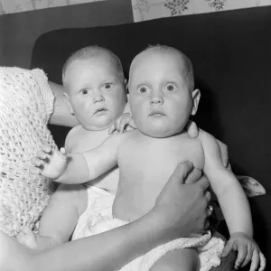 Twins Ian and Robert Kearns who both weighed eight pounds two ounces when they were born Twins Ian and Robert Kearns who both weighed eight pounds two ounces when they were born
