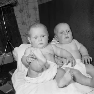 Twins Ian and Robert Kearns who both weighed eight pounds two ounces when they were born Twins Ian and Robert Kearns who both weighed eight pounds two ounces when they were born