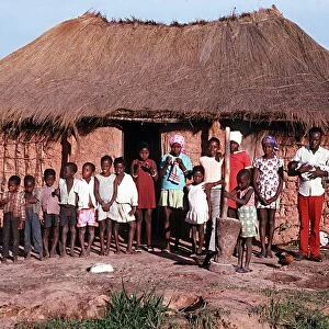 A typical African hut and villagers in Quimbang Africa