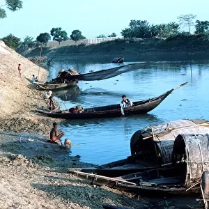Typical river scene net fishing near Dacca Bangladesh
