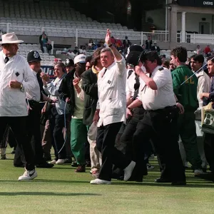 Umpire Dickie Bird waves to the crowd at the end of his last match as a Test Umpire in Umpire Dickie Bird waves to the crowd at the end of his last match as a Test Umpire in