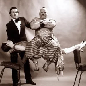 Romark's Assistant Floats with Wrestler, 1971 Print