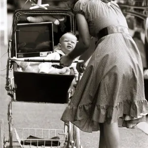 Mother and Baby with Portable TV Print, 29th July 1977 Mother and Baby with Portable TV Print, 29th July 1977