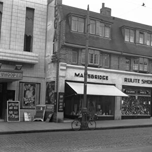 Uxbridge, High Street, shops to right of Regal Cinema( Mansbridge and Rulite
