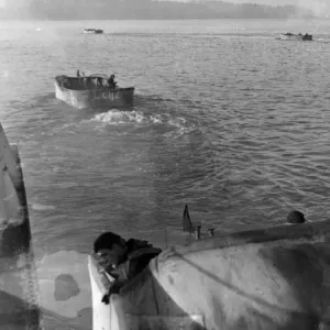 Valentine tanks leaving the ramp of a landing craft and entering the sea about 3000 yards
