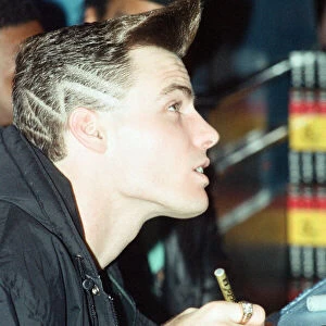 Vanilla Ice signs autographs at Tower Records, Piccadilly. 3rd December 1990