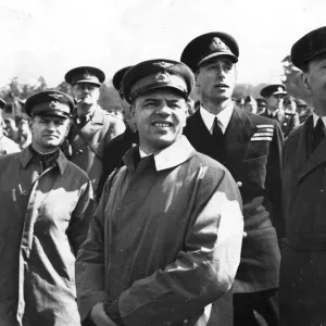 Vic-Admiral Lord Louis Mountbatten (standing at the back - 2nd from right in his uniform Vic-Admiral Lord Louis Mountbatten (standing at the back - 2nd from right in his uniform