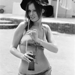 Vicki Michelle, British actress, relaxes in her garden with a cold drink, Epping, Essex Vicki Michelle, British actress, relaxes in her garden with a cold drink, Epping, Essex