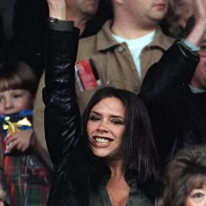 Victoria Adams member of pop group the Spice Girls suddenly likes football as she visits
