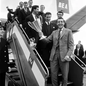 The victorious Tottenham Hotspur team holding European Cup Winners Cup Winners trophy as