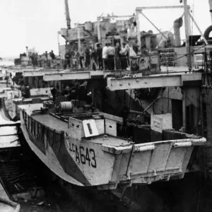 A view alongside an L. S. I showing landing craft swung on, davits A view alongside an L. S. I showing landing craft swung on, davits