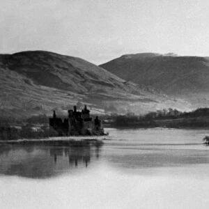 A view across Loch Awe to Kilchurn Castle in Argyll and Bute, Scotland. 16th January 1954
