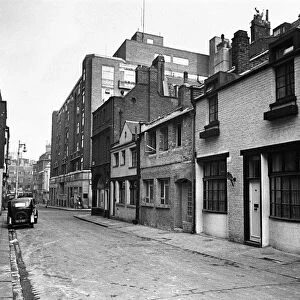 View along Shepherd Street in Mayfair, central London. Circa 1948