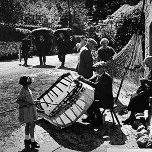 A Village Street Scene Print, Circa 1945 A Village Street Scene Print, Circa 1945