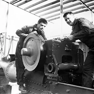 A vintage 1947 steam roller being restored by Joe Shiel, left