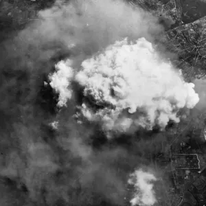 A Volcano of smoke spouts up from Hanovers sprawling tyre factories after a heavy
