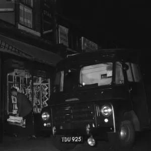A W H Smith wholesale newsagents delivery driver seen here leaving the morning papers A W H Smith wholesale newsagents delivery driver seen here leaving the morning papers