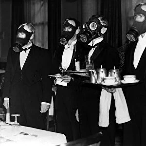 Waiters wearing gas masks during an exercise at the Royal Station Hotel