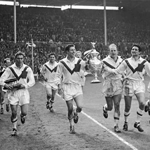 Wakefield Trinity players on their lap of honour following their victory in the Rugby