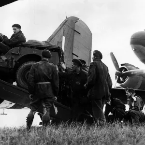 War: France Airborne September 1944 A jeep unloaded by men of the airborn division