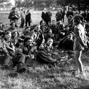War: Invasion of France June 1944 10 years old Edna McCundle entertains the troops