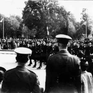 War - World War II - Cardiff - VE Day - Victory Parade marches past the City Hall - May War - World War II - Cardiff - VE Day - Victory Parade marches past the City Hall - May