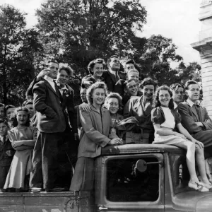 War - World War II - Yound people in Cardiff climb on board a lorry to use it as a War - World War II - Yound people in Cardiff climb on board a lorry to use it as a