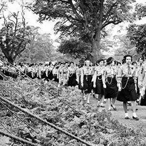 Warwickshire Girl Guide patrol leaders marching to a service held in their jubilee camp