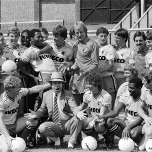 Watford FC chairman Elton John with Watford football team at a photocall