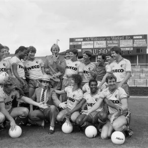 Watford FC chairman Elton John with Watford football team at a photocall
