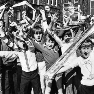 Wayne Ashe (right) leads the cheers from the Loyal Liverpool fans at Anfield Junior Boys Wayne Ashe (right) leads the cheers from the Loyal Liverpool fans at Anfield Junior Boys