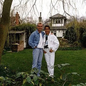 Wayne Dobson Magician with Wife Karen Dobson in rear garden of cottage Dbase A©Mirrorpix