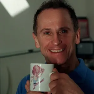 Wayne Sleep / Dancer / Actor September 98 Holding a cup with a picture of Princess