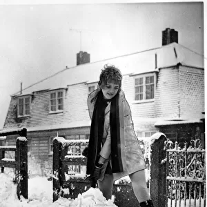 Weather - 17th Dec 1969 - Mrs Gwen Evans clears the snow with her shovel after Wales