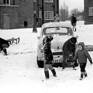 Weather: Winter Scenes: Children from the Grange estate East Finchley take advantage of