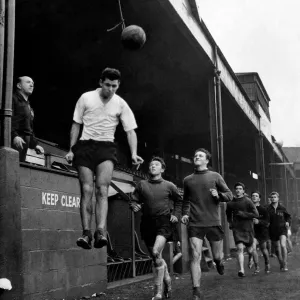 Welsh footballer Mel Nurse goes up for the ball during heading practice Welsh footballer Mel Nurse goes up for the ball during heading practice