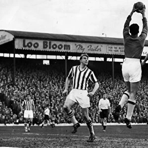 West Brom footballer Ray Barlow watches goalkeeper in action during a league match