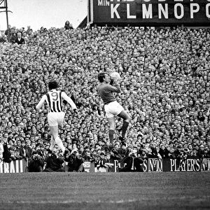 West Bromich Albion v Manchester United-Stepney collects as Astle of Albion flies in