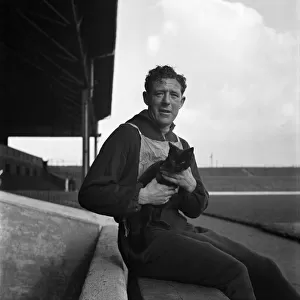West Bromwich Albion F. C. Jack Vernon with. Jopsy, Kitten mascot. March 1949 O17171-001
