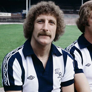 West Bromwich Albion footballer Tony Brown poses for a portrait at a photocall at The