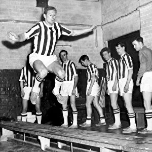 West Bromwich Albion footballers led by Derek Kevan, pictured during an indoor training