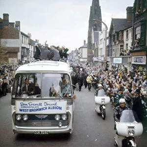The West Bromwich Albion team are welcomed home by thousands of jubilant fans who lined
