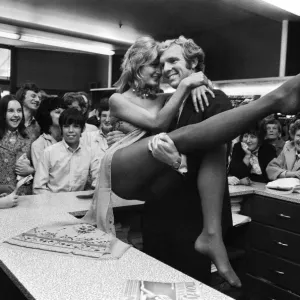 West Ham and England football star Bobby Moore with model Kate Howard in Oxford Street West Ham and England football star Bobby Moore with model Kate Howard in Oxford Street