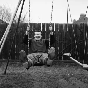 West Ham footballer Johnny Byrne celebrates his England call up with a swing in the back West Ham footballer Johnny Byrne celebrates his England call up with a swing in the back