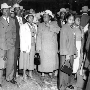 West Indian immigrants arriving at a London Terminal in 1962