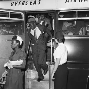 One hundred and two West Indians seen here arriving at Heathrow Airport from Kingston One hundred and two West Indians seen here arriving at Heathrow Airport from Kingston